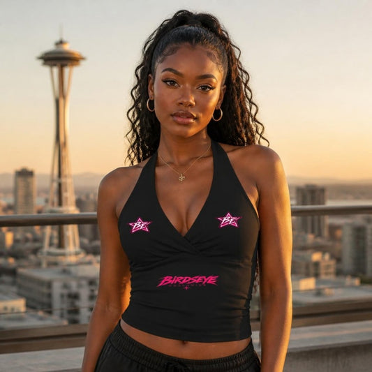 Model wearing the Pink Star Halter Tank with the Space Needle behind