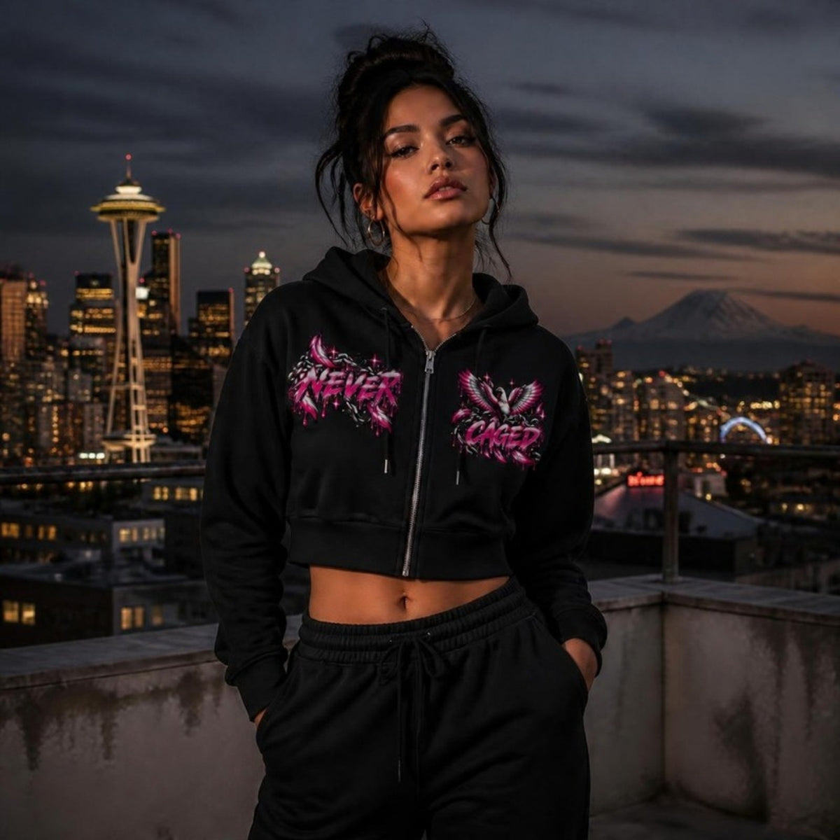 Never Caged Cropped Zip Hoodie worn in Seattle at dusk